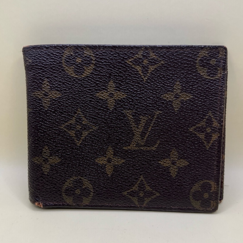 Vinatge Authentic Louis Vuitton Louis vuitton monogram bifold wallet See Details